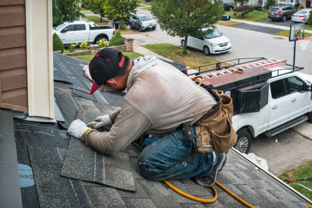 Professional Roof Inspection technician working in Medford, MA